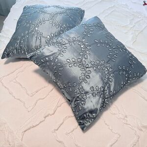 Two decorative throw pillows with sequin embellishment. 18”x 18”.
